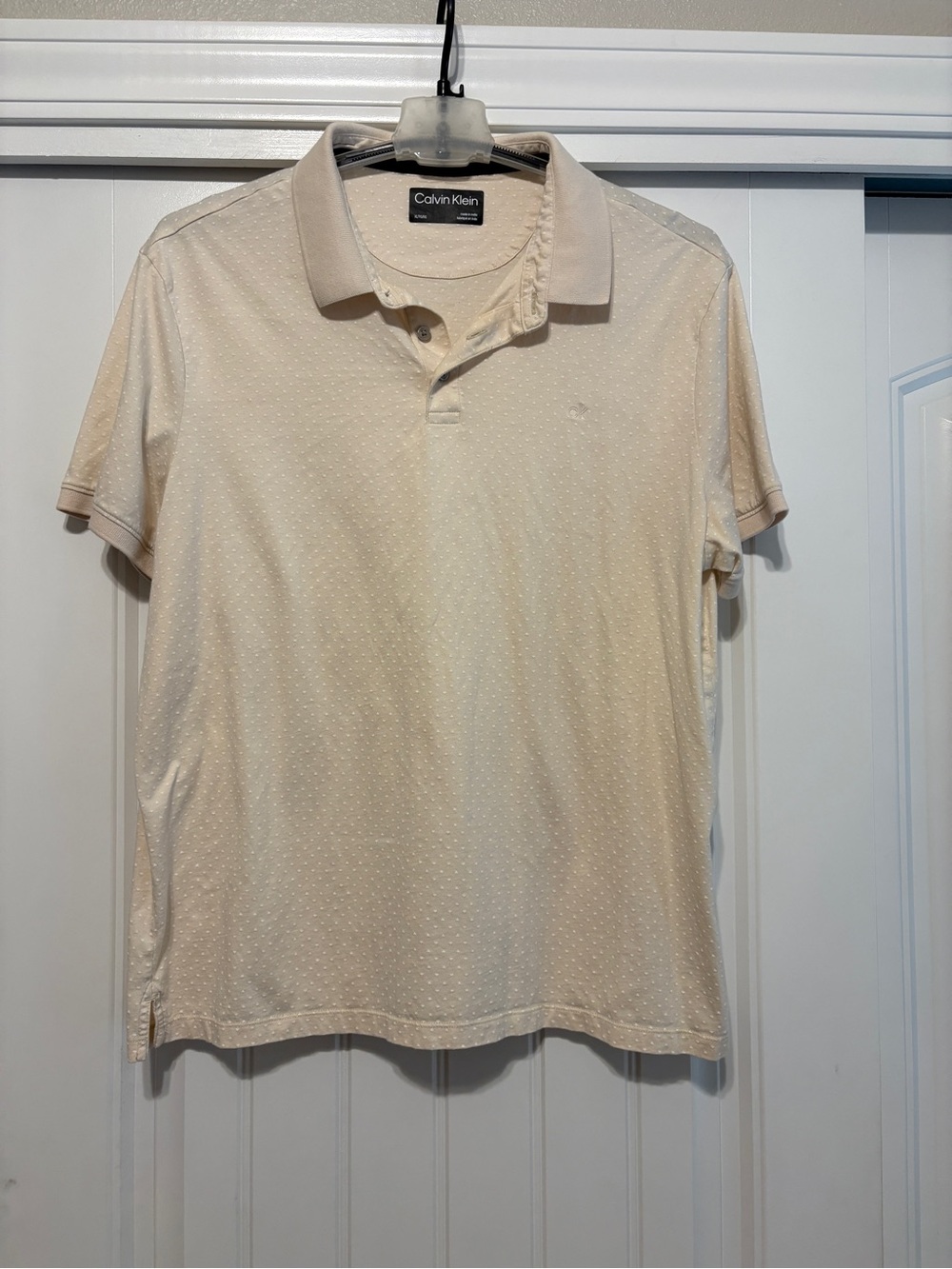 Calvin Klein Men's Light Cream Polo with Subtle Dot Texture